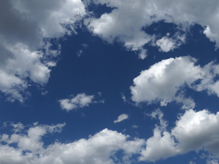 White clouds against blue sky. Nature beautiful background. Deep blue sky and white clouds.の写真素材