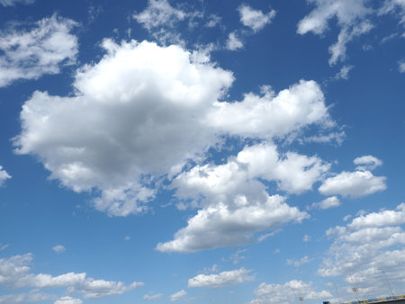 White clouds against blue sky. Nature beautiful background. Deep blue sky and white clouds.の写真素材