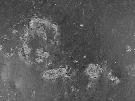 Rusted surface dyed corrugating roof with rust, a spot of unusual shape, texture suitable for retro installation, art objects, space for text, as a backing can be usedの写真素材