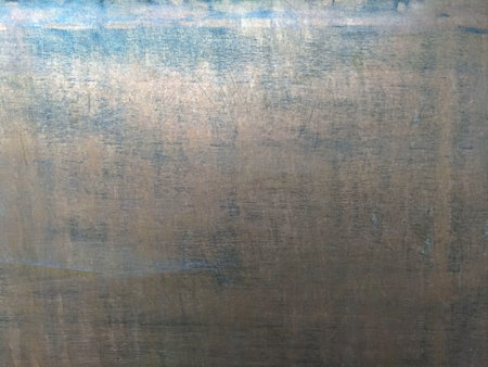 The texture of the wall decoration, metal shiny coating with scuffs retro style, good for the background for unusual installationsの写真素材