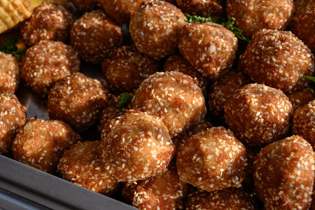 Fried fish balls In breaded sesame, macro, top viewの写真素材