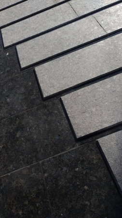 Texrure - decorative finishing of paving of a street fountain marble slabs of different levels of...