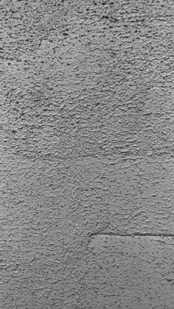 Detailed texture of street plaster with irregularitiesの写真素材