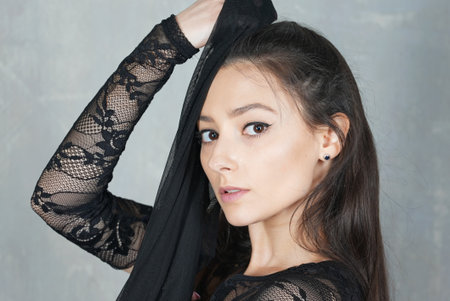 Woman dancer face portrait in motion indoorsの写真素材