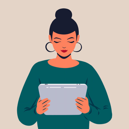 The girl holds in her hands a tablet, reading, browsing Web, messaging, correspondence, flat styleの写真素材