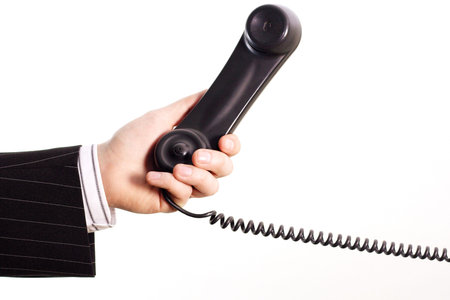 Telephone in a business handの写真素材