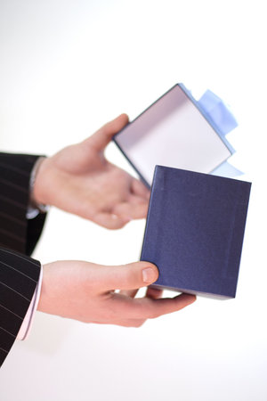 Businessman with giftの写真素材
