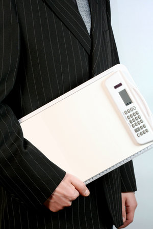 Business man with white cardの写真素材