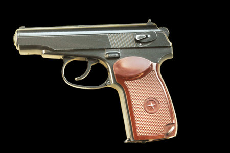 gun isolated on black backgroundの写真素材