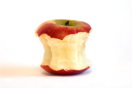 Red apple core, isolated whiteの写真素材