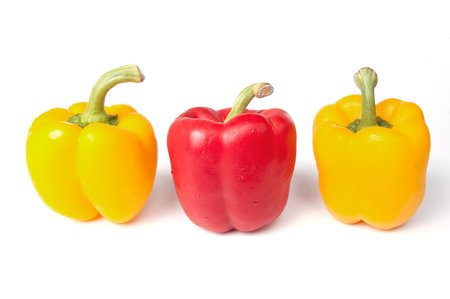 Three bell peppers, isolated on whiteの写真素材