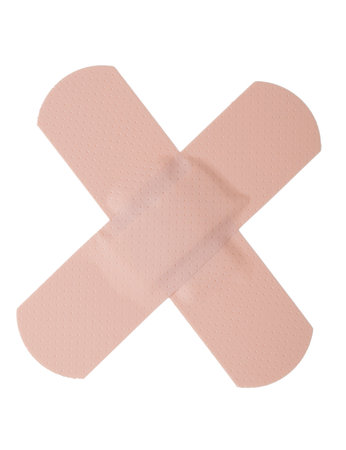 Bandage in cross shape, isolated white background. .の写真素材