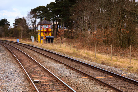 Traditional English Railway Signal Box.  A traditional railway signal box viewed from Armathwaite station on the historic Settle to Carlisle railway in northern England.の写真素材