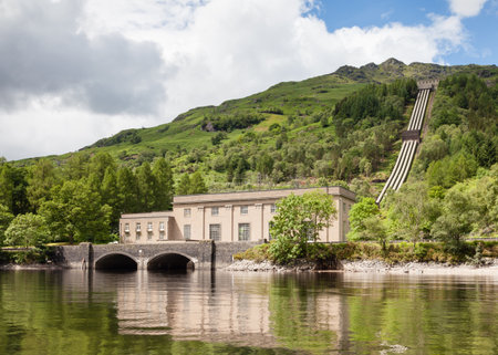Inveruglas Hydroelectric Power Station.  Inveruglas Hydroelectric Power Station on the shores of Loch Lomond in the Scottish highlands.  The power station opened in 1950.のeditorial素材