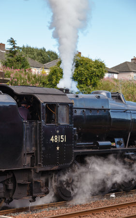 Preserved Stanier Class 8F steam locomotive number 48151 lets of steam in Appleby, England, on the...