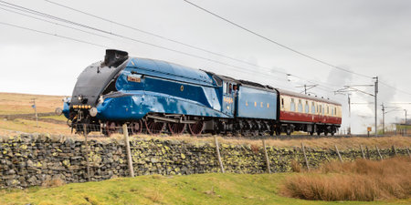 Preserved Sir Nigel Gresley steam locomotive Bittern is pictured on Shap summit, England.のeditorial素材