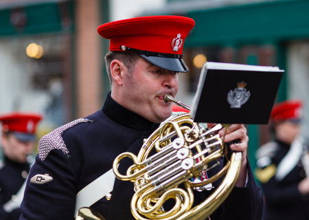 An unidentified member of The Band of The Royal Armoured Corps takes part in the annual May Day parade through Penrith town centre in Cumbria, England.のeditorial素材