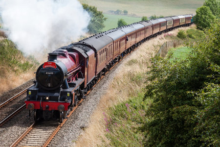 Preserved steam locomotive Galatea heads the Waverley south of Langwathby, England, on the Settle to Carlisle railway.のeditorial素材