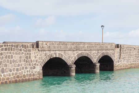 Arrecife Bridge.  A stone bridge in the port city of Arrecife on the Spanish island of Lanzarote.の写真素材