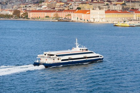 Ferry boat Almeida Garrett is pictured crossing the River Tagus towards the Lisbon waterfront.  The vessel is owned by Transtejo and Soflusa.のeditorial素材