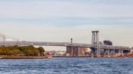 A view of Williamsburg Bridge in New York City.  The bridge spans the East River connecting the boroughs of Manhattan and Brooklyn.のeditorial素材