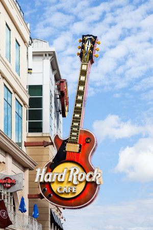 A guitar above the Hard Rock Cafe beside the Niagara Falls, Canada.  Hard Rock Cafe is a chain of rock music themed restaurants.のeditorial素材
