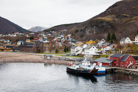 Boats moored on the Ornes quayside in Norway.  Ornes is a village in the county of Nordland, Northern Norway.のeditorial素材