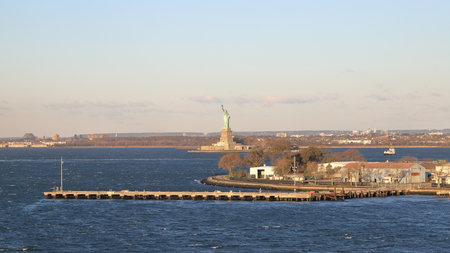 The View Towards the Statue of Liberty.  The view from Brooklyn towards the Statue of Liberty.  The statue of Liberty is located on Liberty Island in New York harbour.のeditorial素材