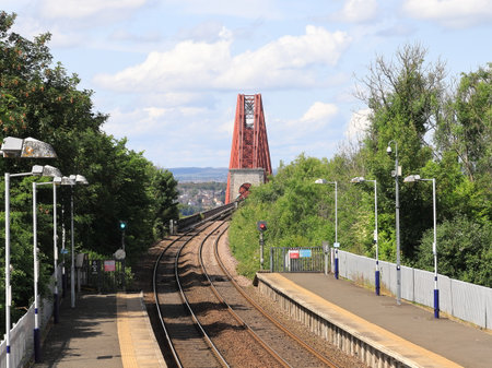 The view from Dalmeny railway station in Scotland looking towards the Forth Bridge.  The bridge...