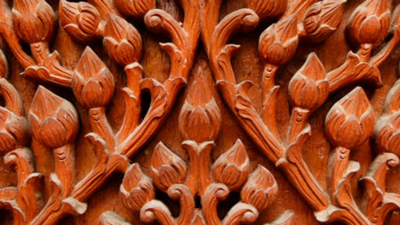 Wood carving on Thai temple windowsの写真素材