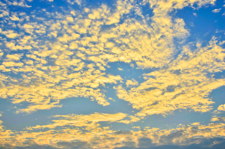  Golden clouds in fresh blue skyの写真素材