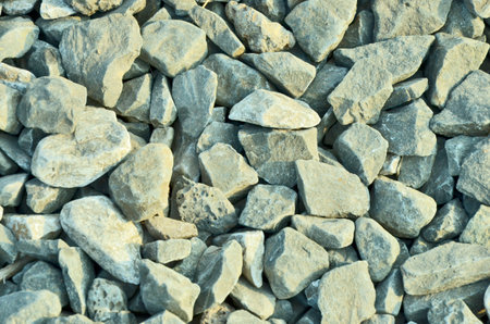 Gray rock texture in sunlight
