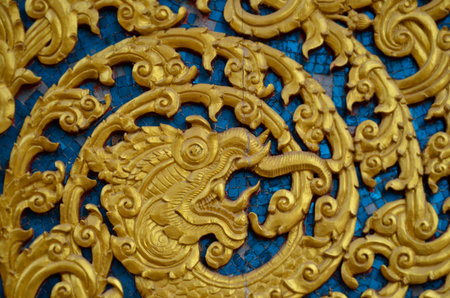 Creature monster sculpture in thai literature on temple wallの写真素材