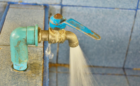 Water stream from the faucetの写真素材