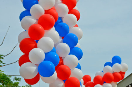 Beautiful color balloons in the airの写真素材