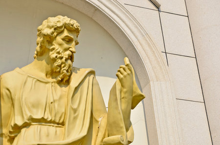 Roman sculpture with white wall backgroundの写真素材