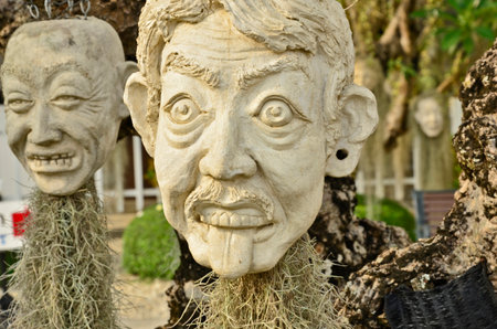 Suffering face with hanging plants