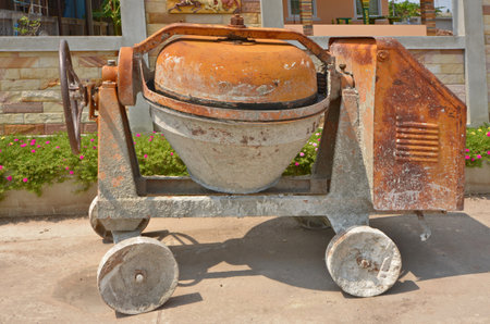 Standing cement mixer machine outdoorsの写真素材