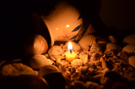 Candle light in the shell tomb