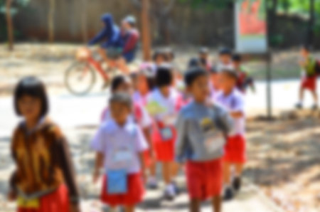 Kindergartens are walking in a field trips, blurの写真素材