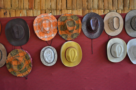 Hung many styles of hat on the wallの写真素材