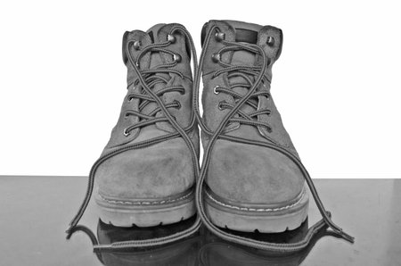 Black and white leather shoes with reflectionの写真素材