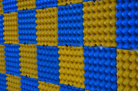 Best design of beautiful blue and yellow egg tray boardの写真素材