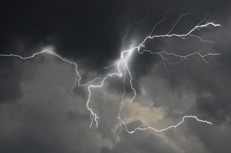 Dangerous lightning in the black rainy clouds in monsoon season