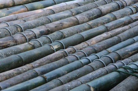 Linking trunk floor with ropes of bamboo raft