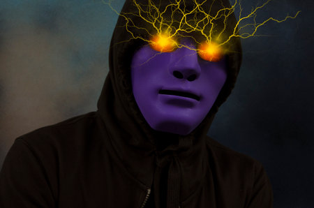 Violet mask man with electric power in eyes