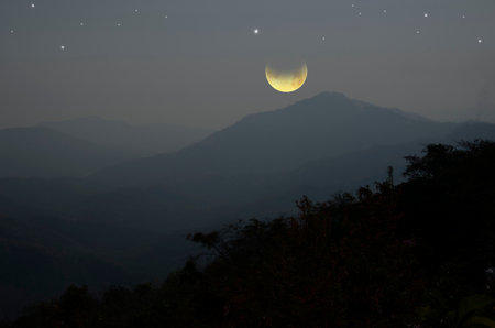 Beautiful waning moon over the mountain