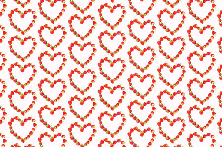 Blank heart pattern of strawberries on white background