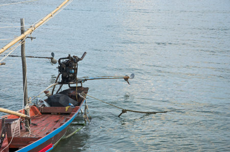 Old engine and propeller of fisherman boat