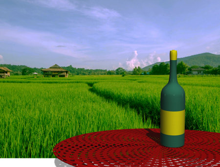 Green wine bottle on red table with green rice field backgroundの写真素材